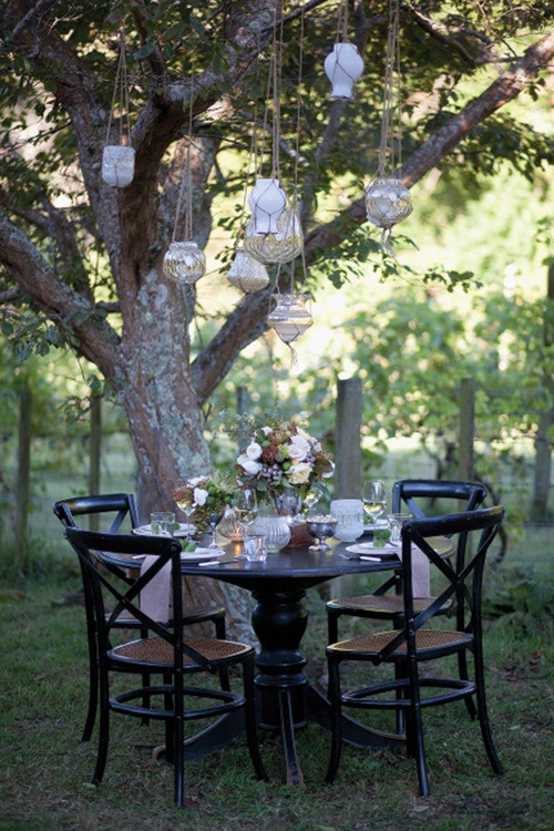 eclectic brown and cream backyard tablescape