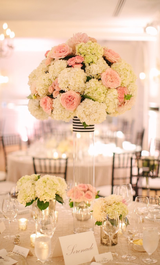 Tall soft and romantic centerpiece with navy and white stripe accents!